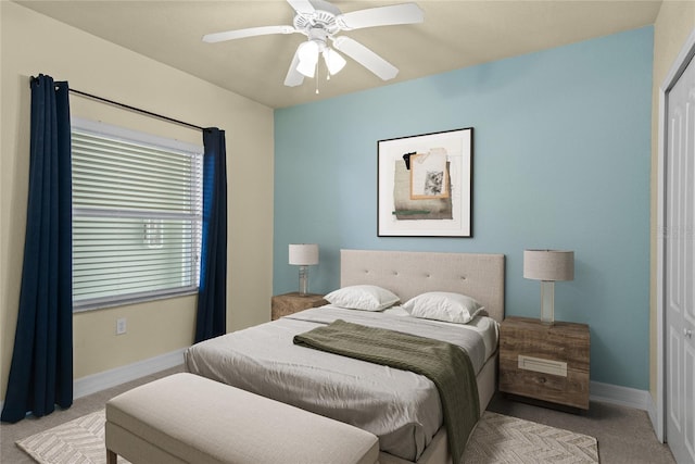 5300 S Atlantic Ave Unit 19-403, New Smyrna Beach, FL 32169 - carpeted bedroom featuring baseboards, a ceiling fan, and a closet