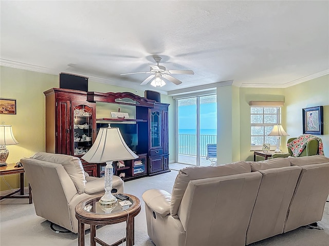 3145 S Atlantic Ave Unit 1001, Daytona Beach, FL 32118 - carpeted living area with ceiling fan and crown molding