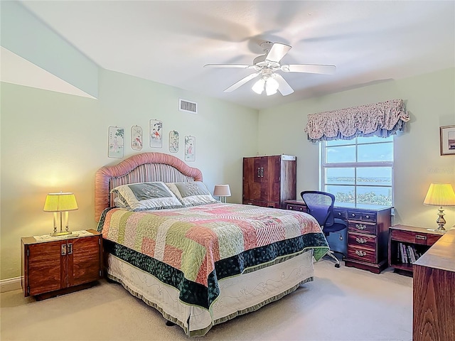 3145 S Atlantic Ave Unit 1001, Daytona Beach, FL 32118 - bedroom with a ceiling fan, visible vents, and light carpet