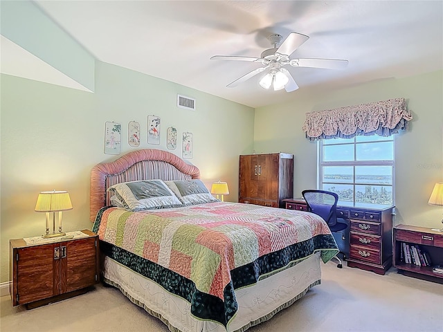 3145 S Atlantic Ave Unit 1001, Daytona Beach, FL 32118 - bedroom with visible vents, a ceiling fan, and light carpet