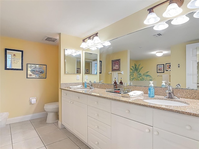 3145 S Atlantic Ave Unit 1001, Daytona Beach, FL 32118 - full bath featuring visible vents, tile patterned flooring, double vanity, and a sink