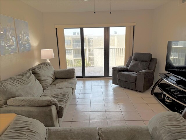 4175 S Atlantic Ave Unit 5280, New Smyrna Beach, FL 32169 - living room with light tile patterned floors