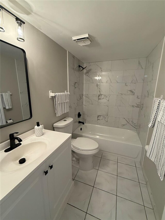 4175 S Atlantic Ave Unit 5280, New Smyrna Beach, FL 32169 - full bathroom with tub / shower combination, vanity, toilet, and marble look tile flooring
