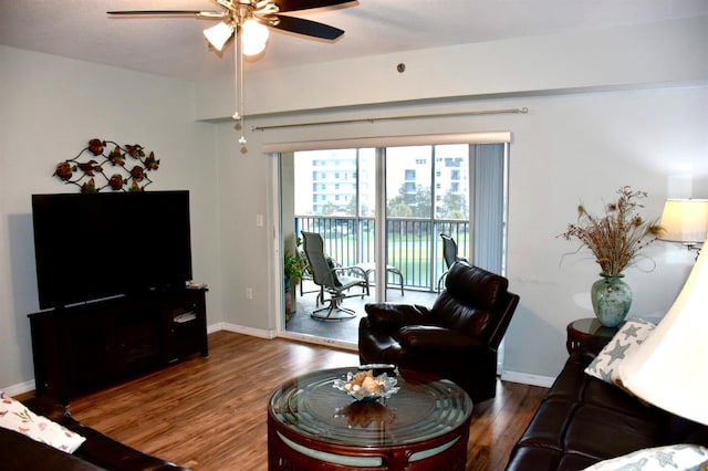 5300 S Atlantic Ave Unit 8-402, New Smyrna Beach, FL 32169 - living area with baseboards, wood finished floors, and ceiling fan