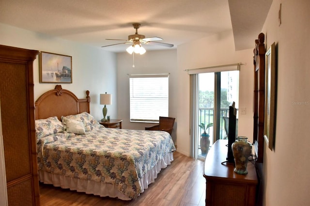 5300 S Atlantic Ave Unit 8-402, New Smyrna Beach, FL 32169 - bedroom featuring ceiling fan, light wood-type flooring, and access to exterior