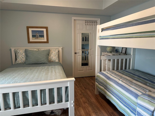 5300 S Atlantic Ave Unit 8-402, New Smyrna Beach, FL 32169 - bedroom with dark wood finished floors