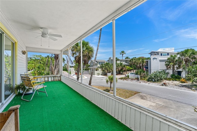 216 Dune Cir, New Smyrna Beach, FL 32169 - sunroom / solarium featuring ceiling fan