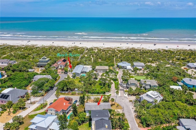 216 Dune Cir, New Smyrna Beach, FL 32169 - birds eye view of property featuring a view of the beach, a residential view, and a water view