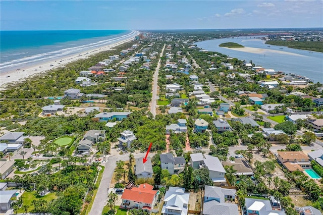216 Dune Cir, New Smyrna Beach, FL 32169 - birds eye view of property featuring a view of the beach, a residential view, and a water view