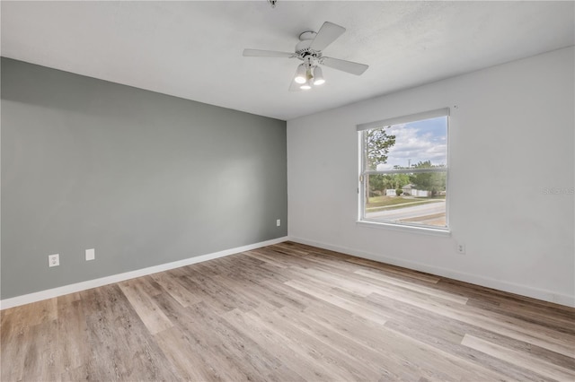 160 Reserve Cir Unit 204, Oviedo, FL 32765 - empty room featuring baseboards, a ceiling fan, and wood finished floors