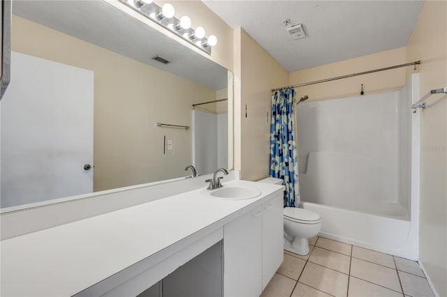 160 Reserve Cir Unit 204, Oviedo, FL 32765 - bathroom with vanity, shower / tub combo with curtain, toilet, tile patterned floors, and visible vents