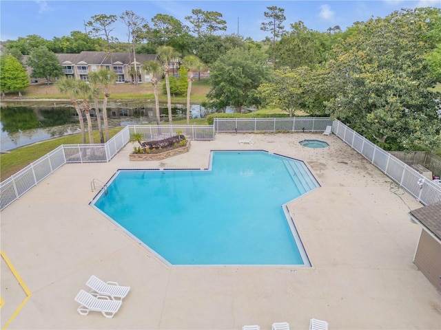 160 Reserve Cir Unit 204, Oviedo, FL 32765 - community pool featuring a hot tub, a patio, and fence