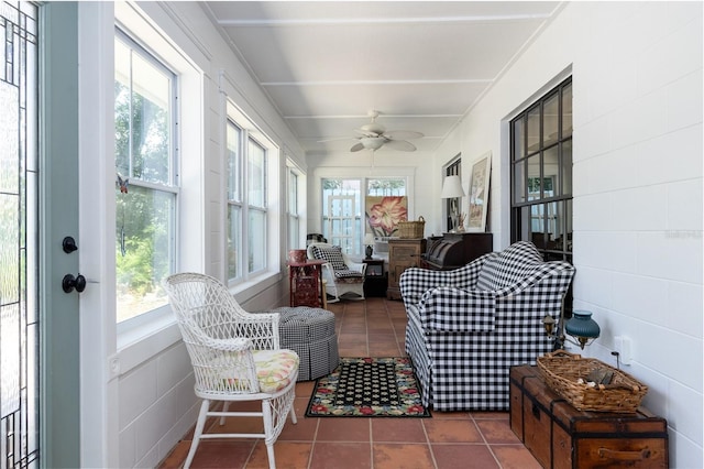 825 E 23rd Ave, New Smyrna Beach, FL 32169 - sunroom / solarium featuring a healthy amount of sunlight, tile patterned floors, and a ceiling fan