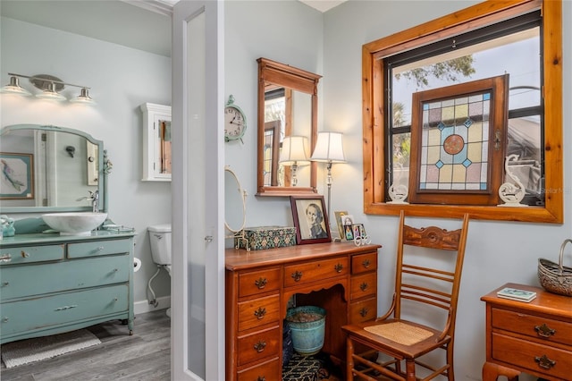 825 E 23rd Ave, New Smyrna Beach, FL 32169 - sitting room with baseboards and wood finished floors