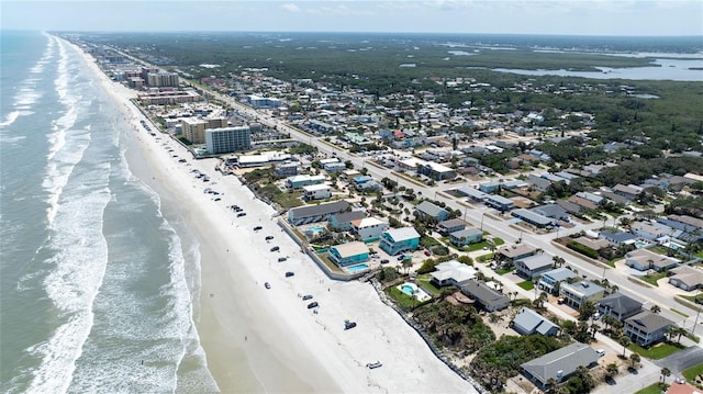 825 E 23rd Ave, New Smyrna Beach, FL 32169 - birds eye view of property with a beach view and a water view