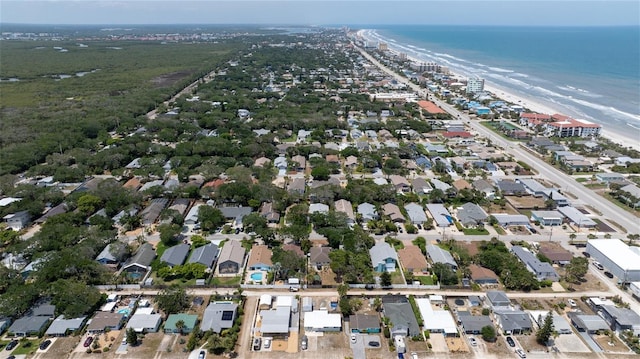 825 E 23rd Ave, New Smyrna Beach, FL 32169 - drone / aerial view featuring a water view and a beach view