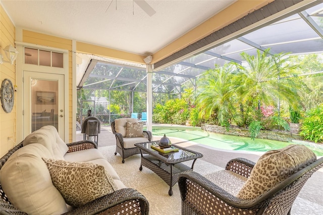 2815 Bay Side Dr, New Smyrna Beach, FL 32168 - view of patio with outdoor lounge area, glass enclosure, a ceiling fan, and an outdoor pool