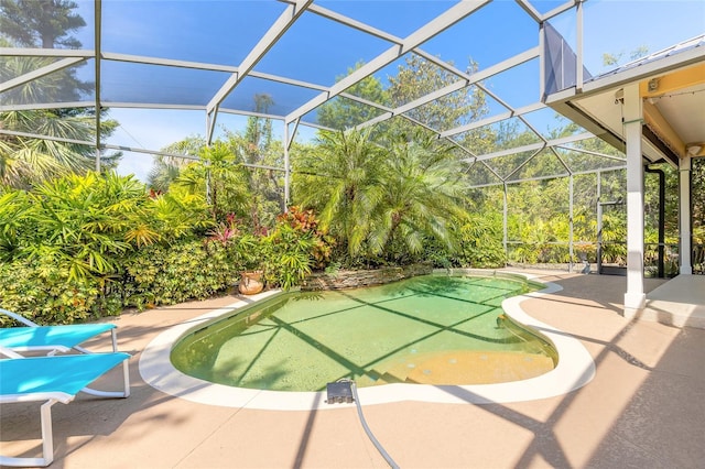 2815 Bay Side Dr, New Smyrna Beach, FL 32168 - view of patio / terrace with a lanai and an outdoor pool