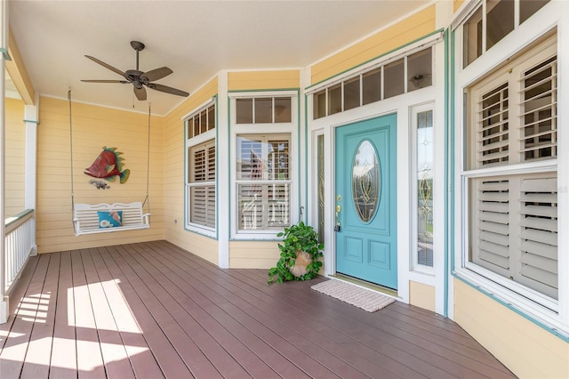 2815 Bay Side Dr, New Smyrna Beach, FL 32168 - entrance to property featuring ceiling fan and a porch