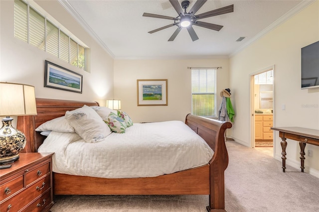 2815 Bay Side Dr, New Smyrna Beach, FL 32168 - bedroom with crown molding, light colored carpet, visible vents, ensuite bathroom, and baseboards