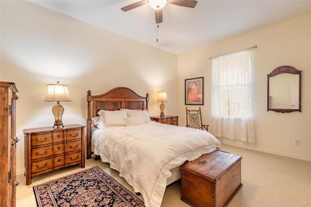 2815 Bay Side Dr, New Smyrna Beach, FL 32168 - bedroom featuring a ceiling fan, carpet floors, and baseboards