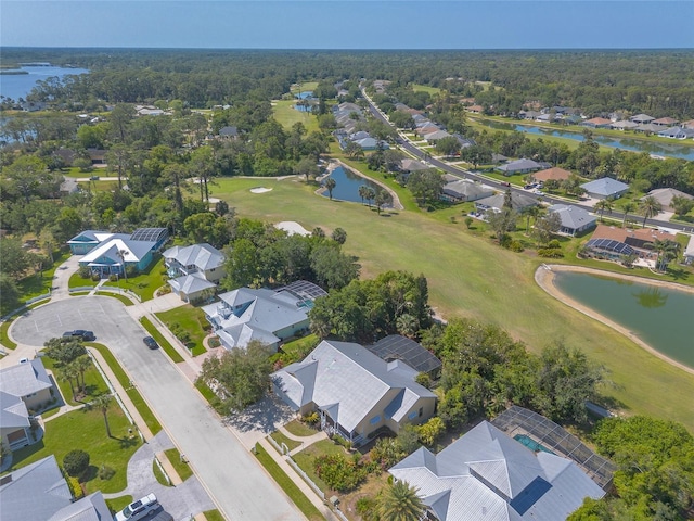 2815 Bay Side Dr, New Smyrna Beach, FL 32168 - birds eye view of property featuring a water view, a residential view, and view of golf course