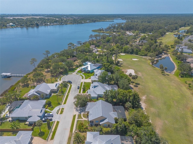 2815 Bay Side Dr, New Smyrna Beach, FL 32168 - bird's eye view with golf course view, a water view, and a residential view