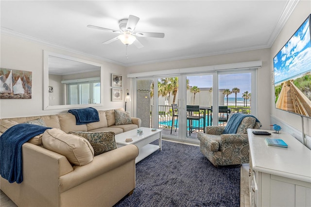 4841 Saxon Dr Unit C201, New Smyrna Beach, FL 32169 - living area featuring crown molding and a ceiling fan