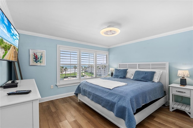 4841 Saxon Dr Unit C201, New Smyrna Beach, FL 32169 - bedroom with crown molding, baseboards, and dark wood-style floors
