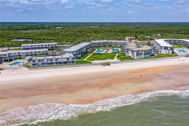4841 Saxon Dr Unit C201, New Smyrna Beach, FL 32169 - aerial view with a water view, a view of trees, and a view of the beach