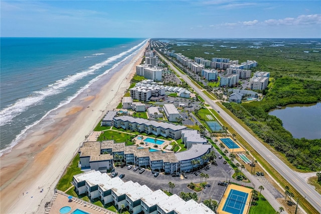 4841 Saxon Dr Unit C201, New Smyrna Beach, FL 32169 - drone / aerial view featuring a water view and a view of the beach