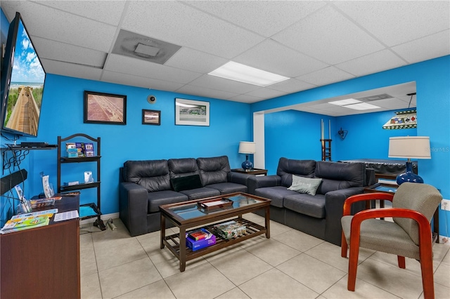 4841 Saxon Dr Unit C201, New Smyrna Beach, FL 32169 - tiled living area with baseboards and a paneled ceiling