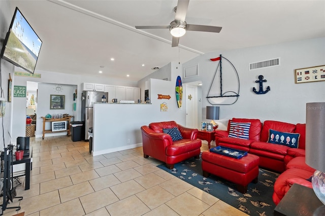 living area with visible vents, light tile patterned flooring, recessed lighting, a ceiling fan, and vaulted ceiling