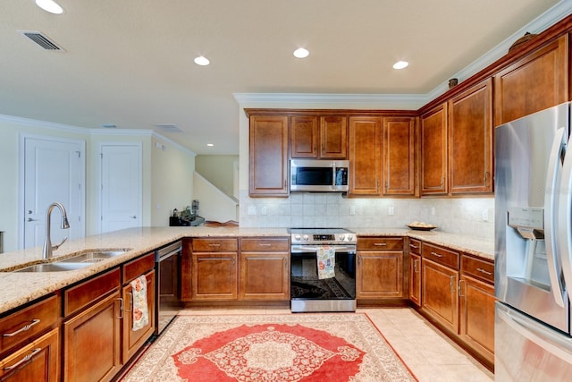 1703 Frogs Leap Ct, Port Orange, FL 32128 - kitchen featuring a sink, tasteful backsplash, visible vents, light stone counters, and appliances with stainless steel finishes
