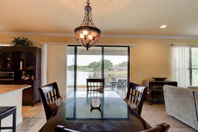 1703 Frogs Leap Ct, Port Orange, FL 32128 - dining area with light tile patterned floors, crown molding, an inviting chandelier, and a water view