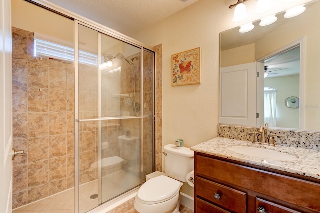 1703 Frogs Leap Ct, Port Orange, FL 32128 - bathroom with toilet, a ceiling fan, a shower stall, and vanity