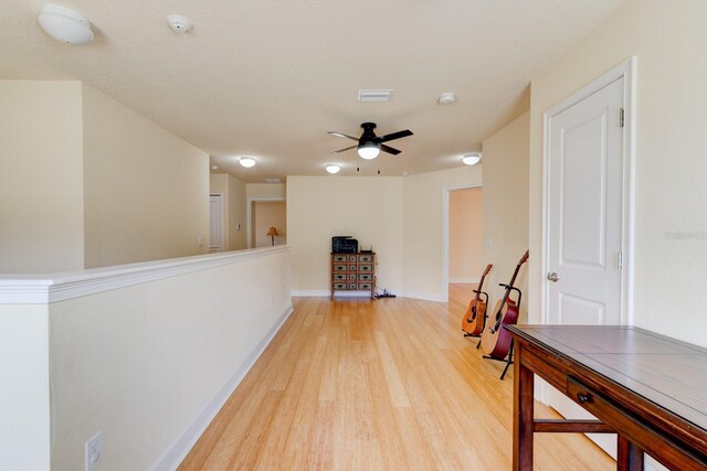1703 Frogs Leap Ct, Port Orange, FL 32128 - hall featuring baseboards, visible vents, and light wood-style floors