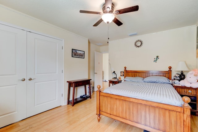 1703 Frogs Leap Ct, Port Orange, FL 32128 - bedroom featuring visible vents, ceiling fan, light wood-style flooring, and a closet