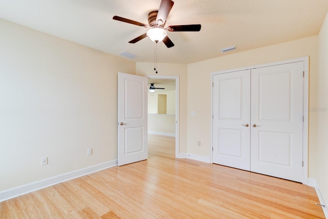 1703 Frogs Leap Ct, Port Orange, FL 32128 - unfurnished bedroom featuring baseboards, visible vents, a closet, and light wood finished floors