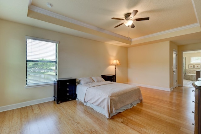 1703 Frogs Leap Ct, Port Orange, FL 32128 - bedroom with a raised ceiling, light wood-style floors, ornamental molding, and multiple windows