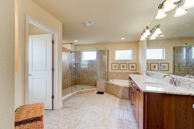 1703 Frogs Leap Ct, Port Orange, FL 32128 - bathroom with a shower stall, a bath, tile patterned flooring, and a sink
