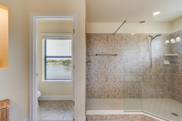 1703 Frogs Leap Ct, Port Orange, FL 32128 - bathroom with a shower stall, baseboards, toilet, recessed lighting, and tile patterned floors