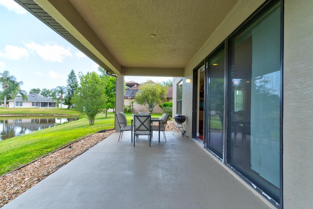 1703 Frogs Leap Ct, Port Orange, FL 32128 - view of patio / terrace with a water view