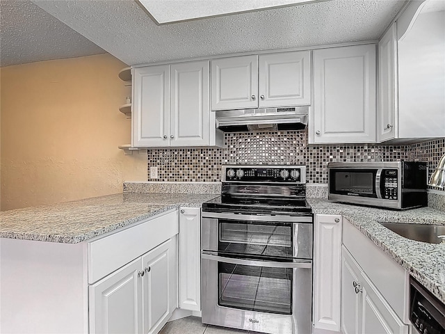 95 Moonstone Ct, Port Orange, FL 32129 - kitchen featuring under cabinet range hood, appliances with stainless steel finishes, a sink, white cabinets, and tasteful backsplash