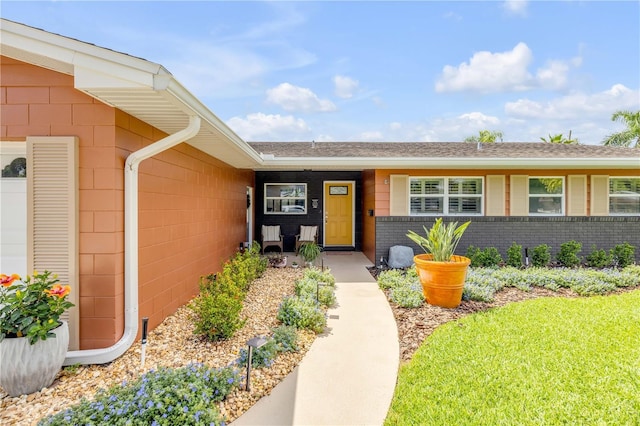 2548 E Compton St, Orlando, FL 32806 - view of exterior entry with concrete block siding
