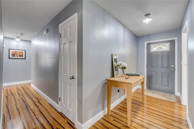 2548 E Compton St, Orlando, FL 32806 - entrance foyer with baseboards and light wood-style floors