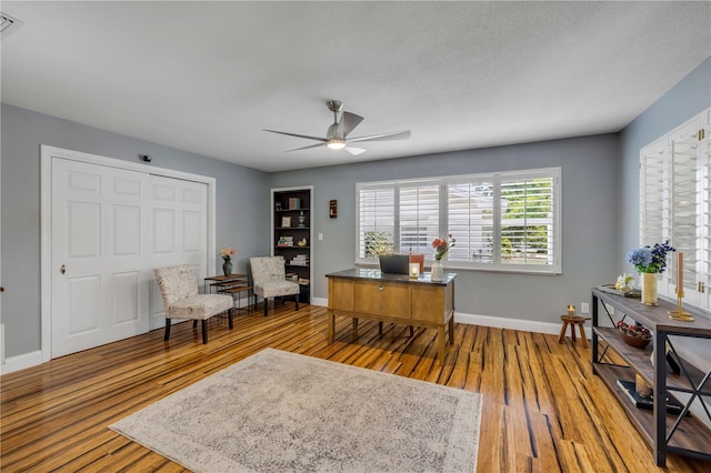 2548 E Compton St, Orlando, FL 32806 - office area with baseboards, ceiling fan, and wood finished floors