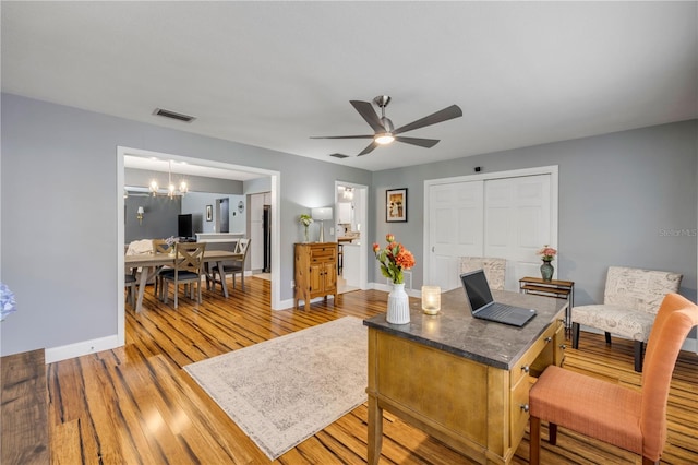 2548 E Compton St, Orlando, FL 32806 - office with baseboards, ceiling fan with notable chandelier, wood finished floors, and visible vents