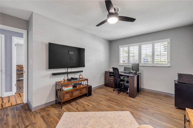2548 E Compton St, Orlando, FL 32806 - home office featuring a ceiling fan, baseboards, and wood finished floors