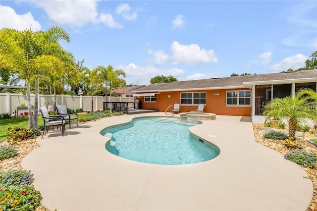 2548 E Compton St, Orlando, FL 32806 - view of pool featuring fence, a patio, and a pool with connected hot tub